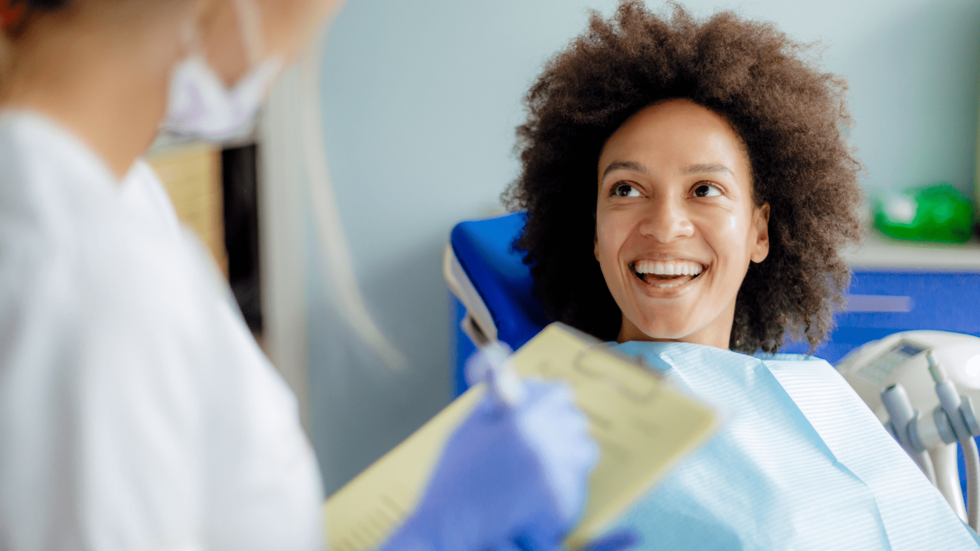 Woman Smiling at Dentist